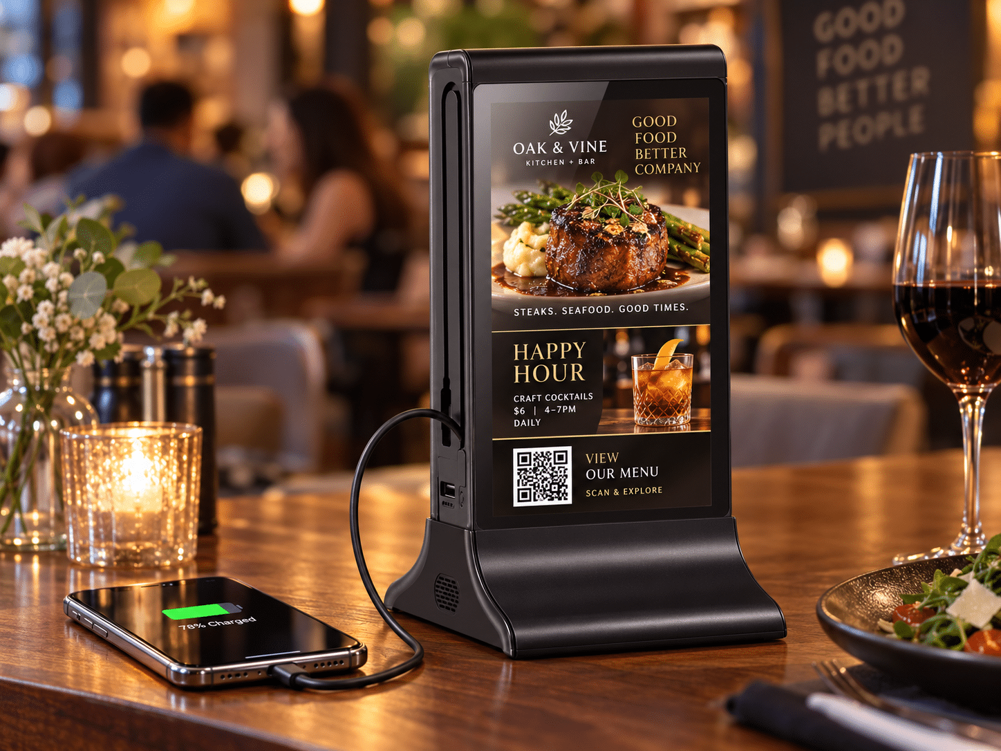 Oak & Vine digital menu board displays steak, seafood, happy hour, and QR code.